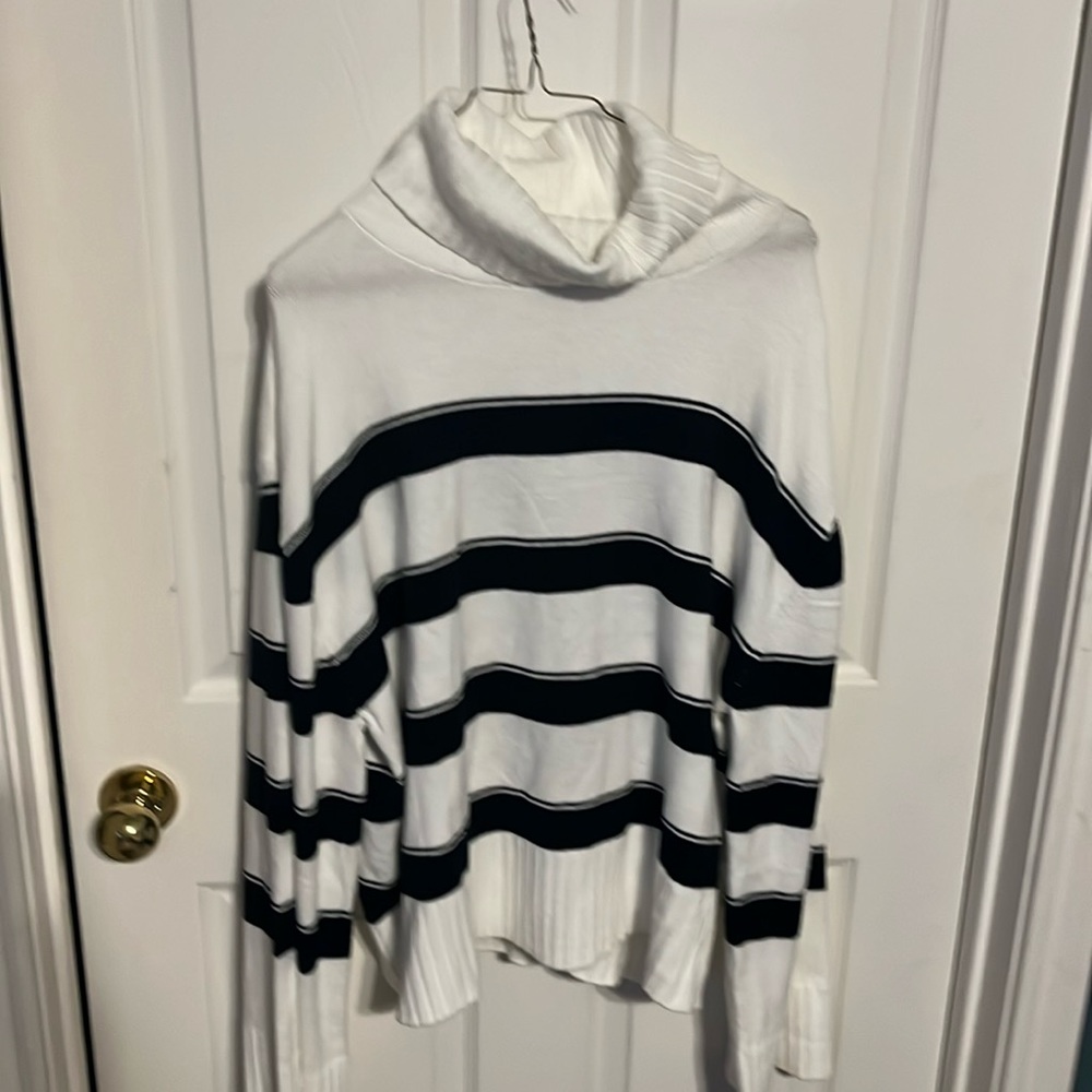 Brand new black and white sweater